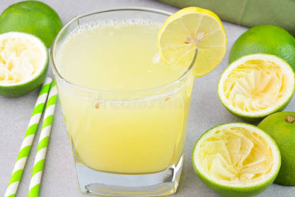Sweet Lime Juice in a Glass Cup Stock